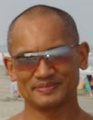 Photo of Leonard Taku